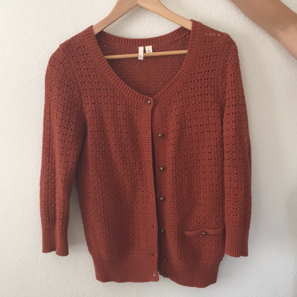 Knit orange cardigan sweater